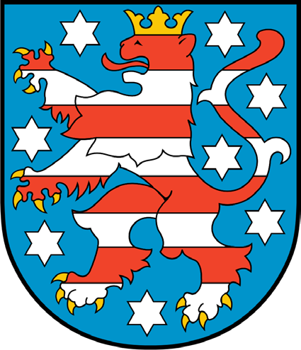 Blaues Wappenschild mit einem aufgerichteten, rot-weiß gestreiften Löwen, umgeben von acht weißen sechsstrahligen Sternen.